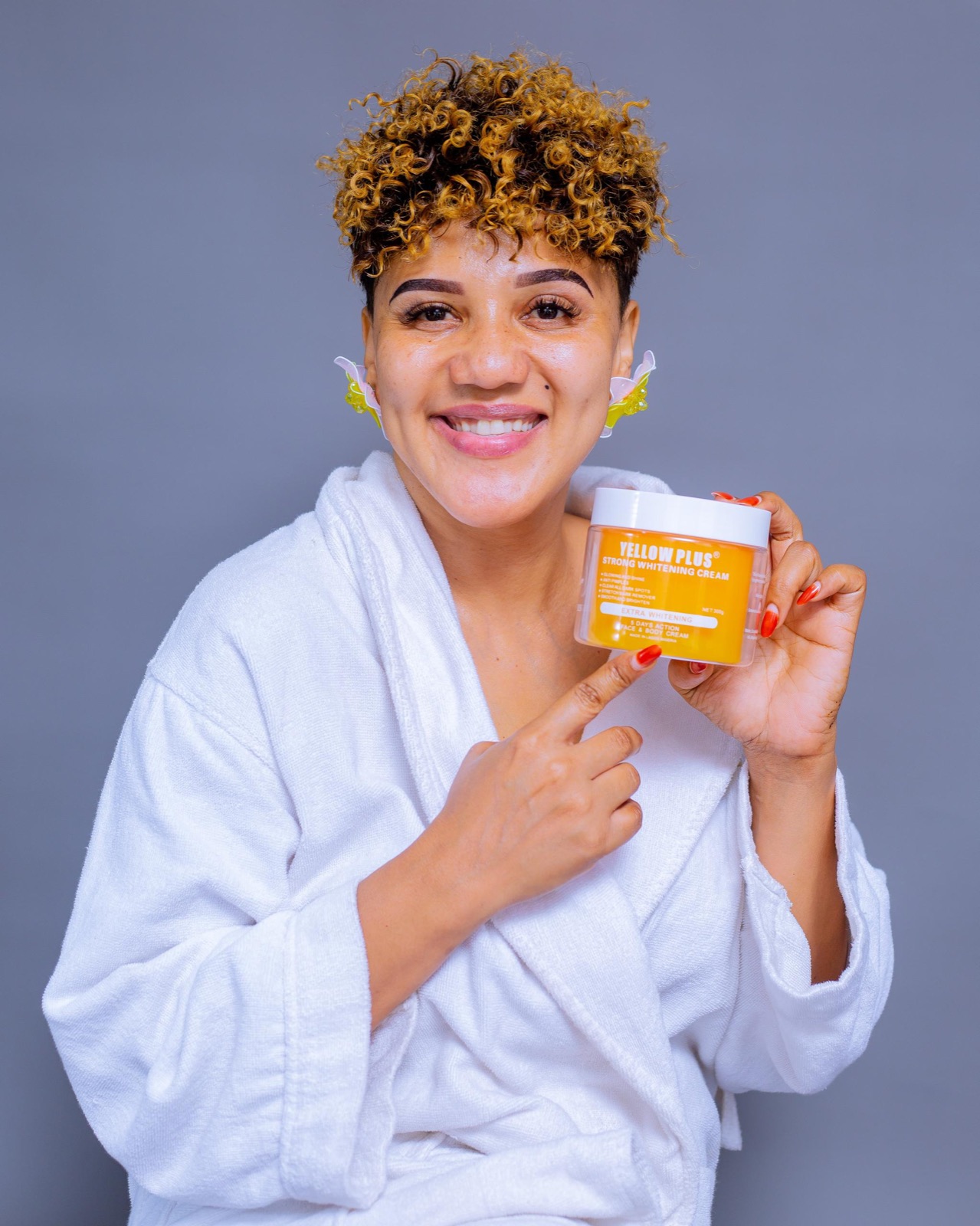 Model presenting Original Plus skincare products